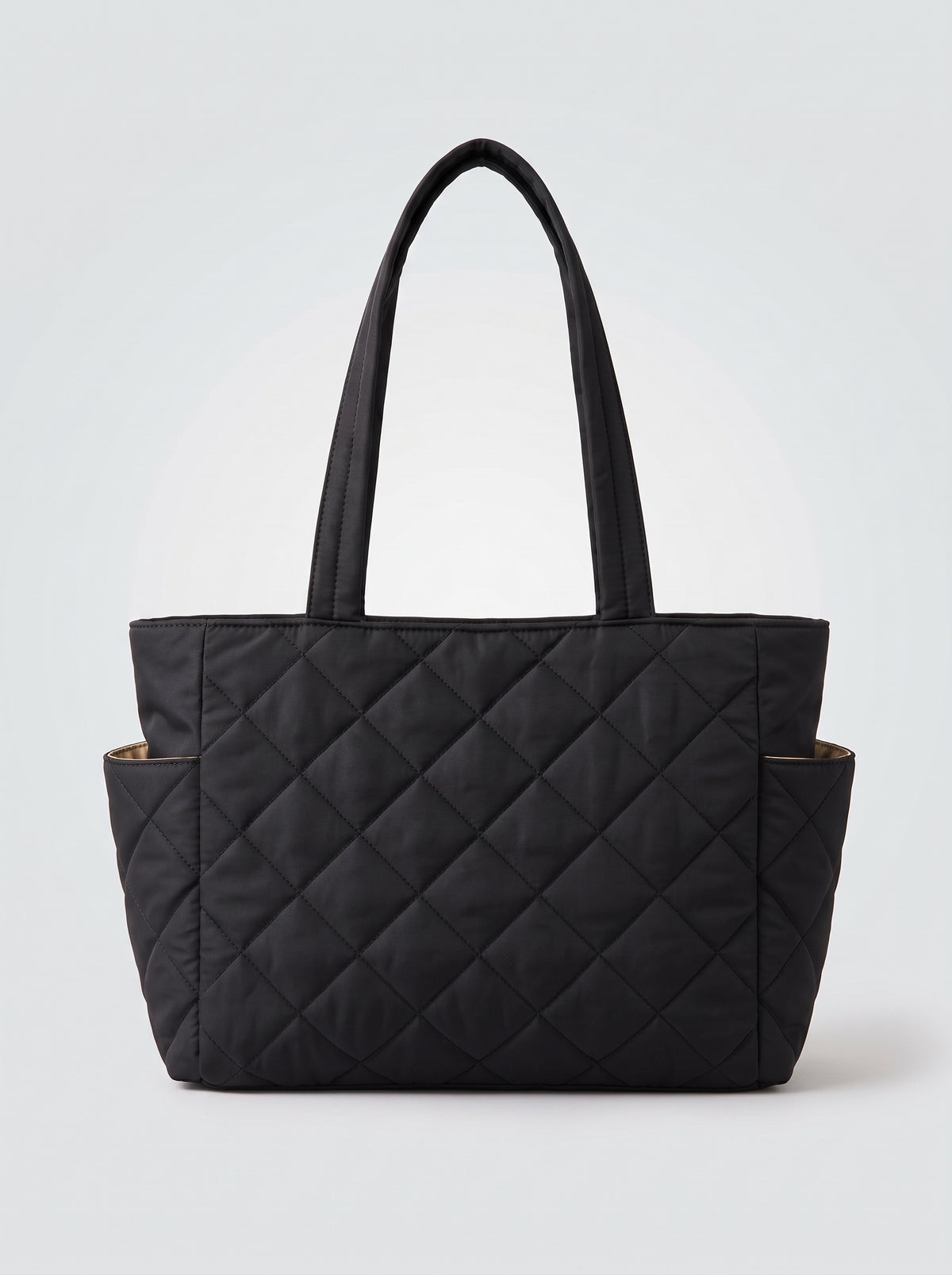 Bolso tote negro acolchado en rombos con asas al hombro