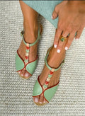 Sandalia verde menta en T con corazones