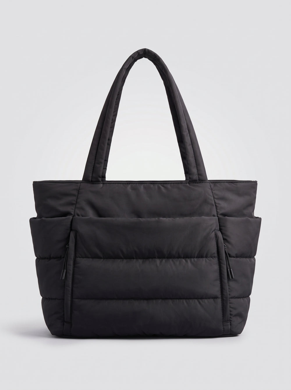 Tote bag negro acolchado con asas y bolsillos laterales