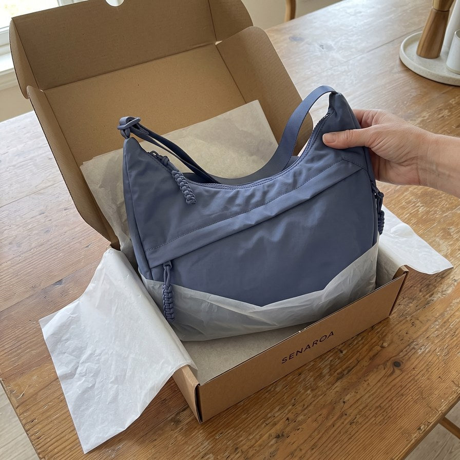 Bandolera Senaroa Nara en azul recién sacada de su caja de envío